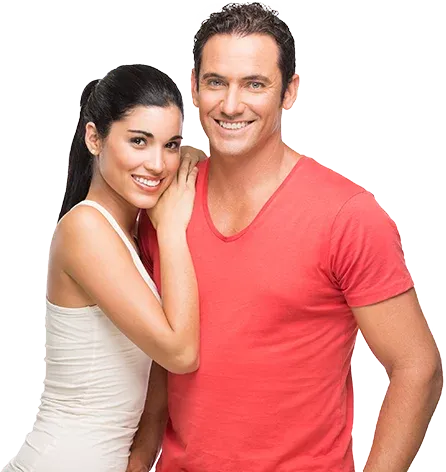 Smiling couple standing together, representing wellness and healthy aging