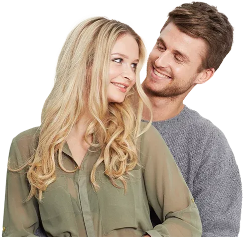 Smiling couple embracing, representing wellness and healthy weight management
